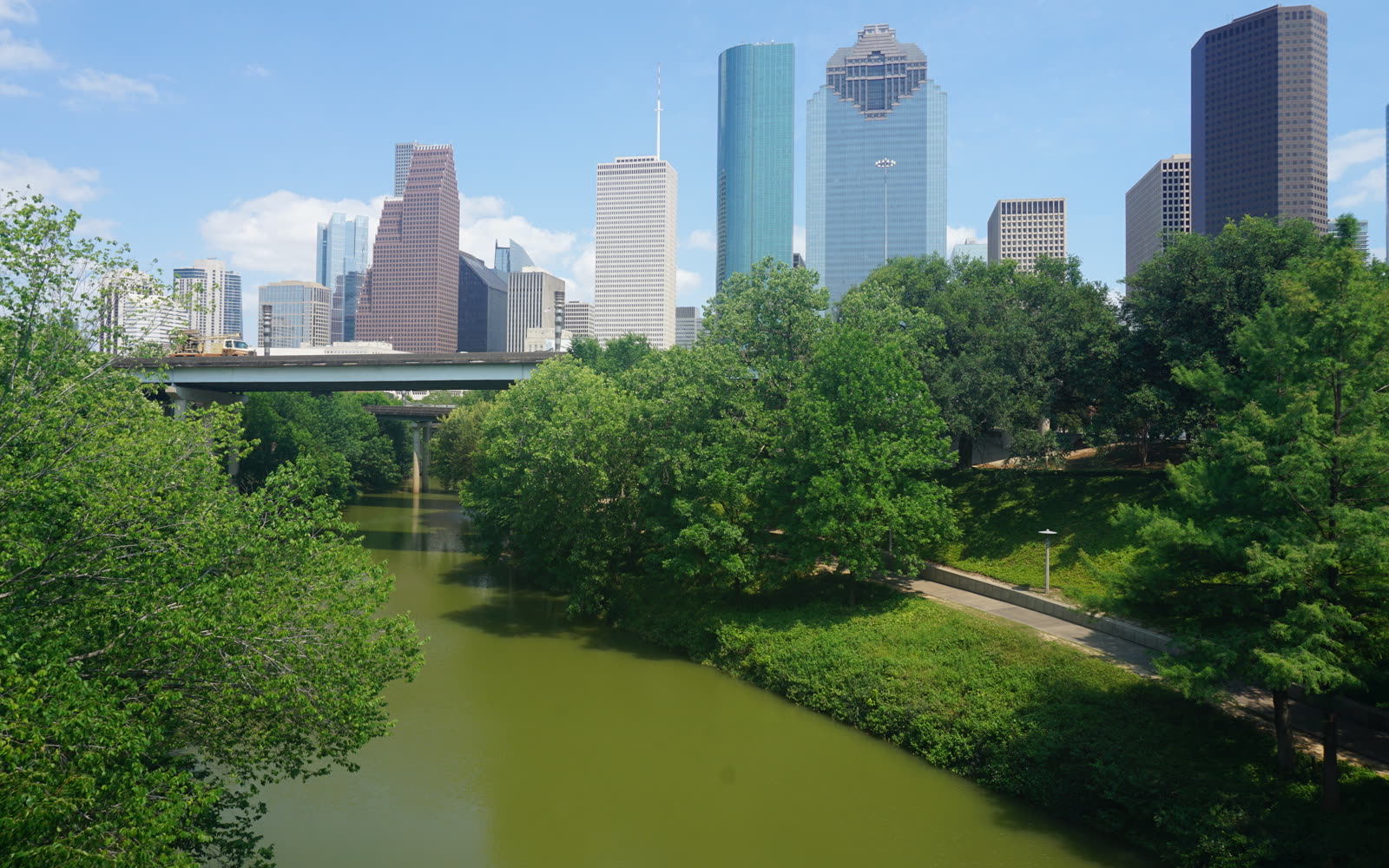 Buffalo Bayou Park lawn and downtown Houston skyline, Texas